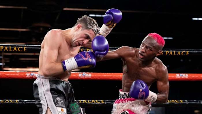Kevin Luis Munoz and Ricardo Malajika during their bout. South African Ricardo Malajika won the vacant IBO junior bantamweight title after beating Argentina's Munoz at the Emperors Palace near Kempton Park in South Africa on Saturday night. GALLO IMAGES.